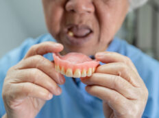 old asian man with dentures